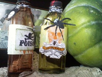 Upcycled Vanilla bottles for Halloween decor! (poison bottles)
